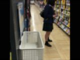 DVDをチェックする制服ちゃん逆さ撮り